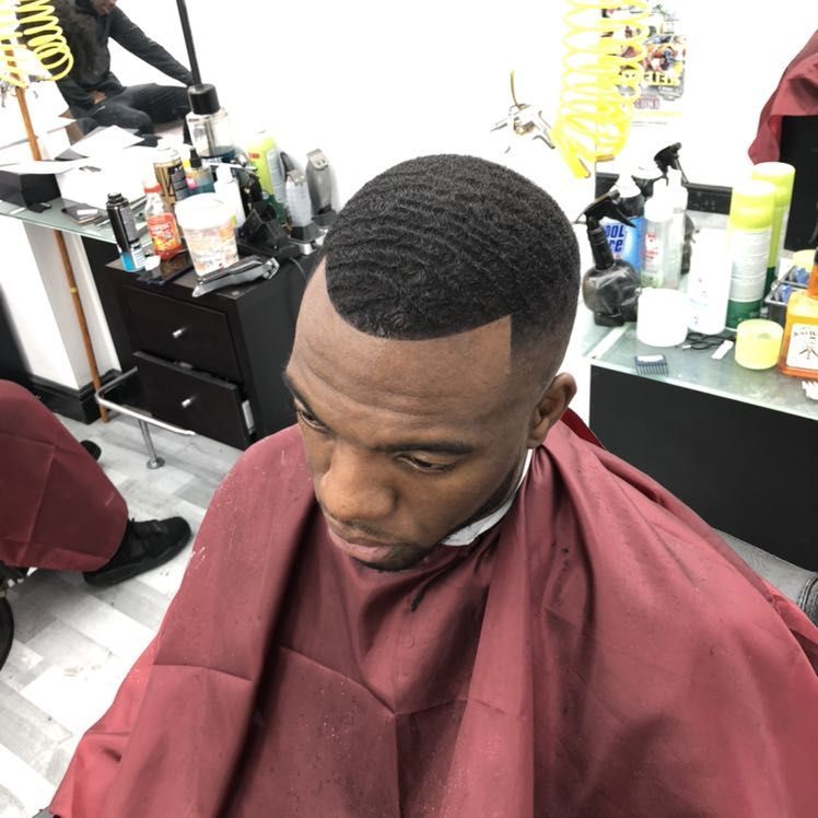 Sharp waves and line-up haircut at 1st Class Fades