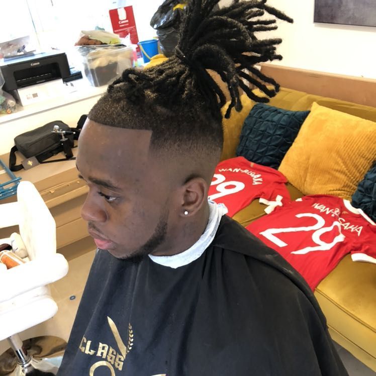 Locs with faded sides at 1st Class Fades